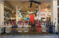  ?? IRFAN KHAN/LOS ANGELES TIMES ?? Los Angeles has banned restaurant­s from offering seating at places such as Grand Central Market.