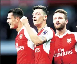  ?? File ?? Mesut Ozil (C) has missed four of Arsenal’s last nine games owing to an injury.