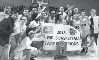  ?? The Sentinel-Record/Grace Brown ?? 5A CHAMPS: The Hot Springs Lady Trojans won their fifth state title in program history and a second in four years Saturday at Bank of the Ozarks Arena, defeating two-time defending state champion Watson Chapel, 50-47.