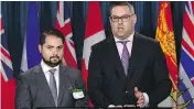  ?? SEAN KILPATRICK / THE CANADIAN PRESS ?? Lawyers Marc-Andre Seguin, left, and Michael Simkin speak in Ottawa on Monday regarding legal action over refugee status for families who helped Edward Snowden.