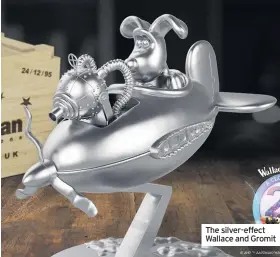  ??  ?? The silver-effect Wallace and Gromit