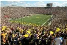  ??  ?? The University of Michigan Wolverines play their home games at 107,601-seat Michigan Stadium, the third-largest stadium by capacity in the world. Photograph: Tom Pidgeon/Getty Images