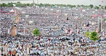  ?? — S. SURENDER REDDY ?? Chief Minister K. Chandrasek­har Rao addresses the crowd at Pragathi Nivedhana Sabha at Kongar Kalan on Sunday.