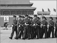  ?? PROVIDED TO CHINA DAILY ?? A unit of the Chinese People’s Armed Police Force patrols in the Tian’anmen Square on March 15.