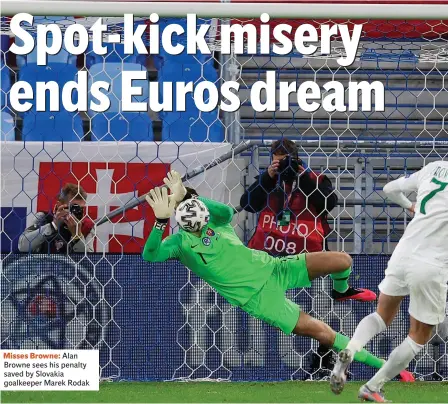  ??  ?? Misses Browne: Alan Browne sees his penalty saved by Slovakia goalkeeper Marek Rodak