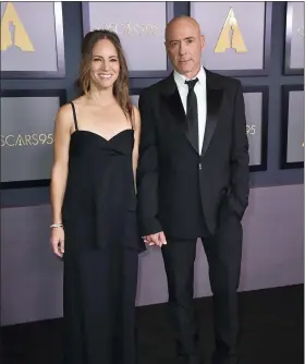  ?? PHOTO BY JORDAN STRAUSS/INVISION/THE ASSOCIATED PRESS ?? Susan Downey, left, and Robert Downey Jr. arrive at the Governors Awards on Saturday, Nov. 19, 2022, at Fairmont Century Plaza in Los Angeles.
