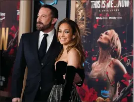  ?? JORDAN STRAUSS/INVISION/THE ASSOCIATED PRESS ?? Ben Affleck, left, and Jennifer Lopez arrive at the premiere of “This Is Me... Now: A Love Story” on Tuesday, Feb. 13, at the Dolby Theatre in Los Angeles.
