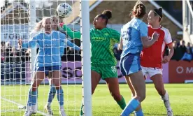  ?? Photograph: Andrew Boyers/Action Images/Reuters ?? Khiara Keating gets a hand to a Beth Mead corner that Arsenal claimed had crossed the line.