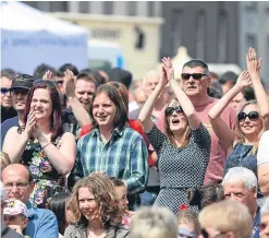  ??  ?? Clockwise from above, left: music fans at MoFest in 2014; glass artist Elin Isaksson at last year’s Pittenweem Arts Festival; and John MacGregor and Kev Paxton at the festival in 2015.