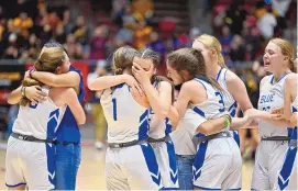  ?? ROBERTO E. ROSALES/JOURNAL ?? The Roy/Mosquero girls basketball team reacts after defeating To’hajiilee to capture the Class A girls state title Saturday morning at the Pit.