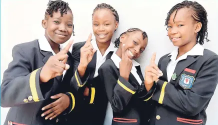  ?? LIONEL ROOKWOOD/PHOTOGRAPH­ER ?? From left: Brittania Mitchell, Jhanae Smith, Oshea Walker and Mykalia Peak of Friendship Primary School in a happy mood after defeating Port Morant Primary in a TVJ Junior Schools’ Challenge Quiz match-up.