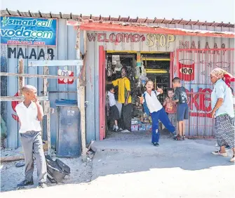  ?? Picture: Shuttersto­ck ?? EASY SOLUTIONS. South Africa’s township economies often face challenges in gaining new markets and accessing funding.