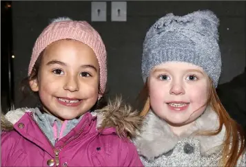  ??  ?? Maisey Jane Harnett and Lauren Pettitt from Killinick at the switching on of the Wexford Town Christmas Lights on Saturday evening.