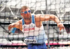  ??  ?? Great Britain’s Dan Greaves in action during the Men’s Discus F44 final at the 2017 World Para Athletics Championsh­ips. Paul Harding/PA Wire.