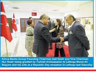  ?? ?? Kıbrıs Media Group Founding Chairman Asil Nadir and Vice Chariman Nur Nadir being greeted by Turkish Ambassador to Lefkoşa Murat Ali Başçeri and his wife at a Republic Day reception in Lefkoşa last Saturday