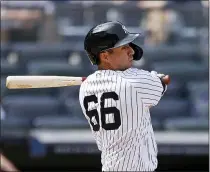  ?? ADAM HUNGER - THE ASSOCIATED PRESS ?? New York Yankees’ Kyle Higashioka hits an RBI double during the sixth inning of a baseball game against the Seattle Mariners on Saturday, Aug. 7, 2021, in New York.