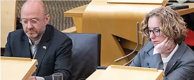  ?? ?? Grim look: Patrick Harvie and Lorna Slater in Holyrood after dismissal by Humza Yousaf