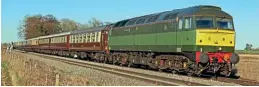  ?? Paul Biggs ?? Three locomotive­s belonging to West Coast Railways have been named over the past few weeks, with BR two-tone green 47815 regaining the name Great Western. In bright sunlight, the recently renamed 47815 passes East Goscote, near Syston East Junction, with 57316 Alnwick Castle (also recently named by WCR) at the rear on March 19, working 1Z76, the 12.40 Sheffield to Derby Northern Belle.