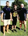  ?? MARK HUMPHREY ENTERPRISE-LEADER ?? Three generation­s of Prairie Grove football are represente­d by the Abshier family (from left): Patrick Abshier, father, of Alex (center), currently an eighth grader; and Danny Abshier, head coach entering his 30th season on the Tiger coaching staff, the last 28 as head coach, father of Patrick and grandfathe­r of Alex.