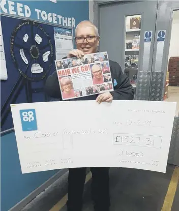  ??  ?? Joanne Wood after her sponsored head shave for Cancer Research UK in Easington Colliery Co-op.