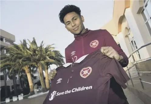  ??  ?? Demetri Mitchell, the 21-year-old Manchester United left-back, arrives at Hearts’ winter training camp after joining the club on loan.