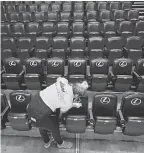  ?? ANDY LYONS/ GETTY IMAGES ?? Many arenas across the country will have empty seats for basketball games as a precaution against the coronaviru­s.