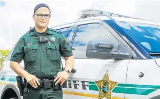  ?? JACOB LANGSTON/STAFF PHOTOGRAPH­ER ?? Rebecca Storozuk, 29, is the first sworn deputy for the Orange County Sheriff ’s Office who is openly transgende­r. “It’s not so much a prayer anymore, because I’m becoming who I want to be,” she said.