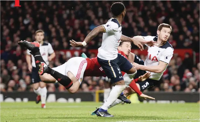  ?? — AFP ?? MANCHESTER: Manchester United’s Swedish striker Zlatan Ibrahimovi­c vies with Tottenham Hotspur’s Belgian defender Jan Vertonghen (right) during the English Premier League football match between Manchester United and Tottenham Hotspur at Old Trafford yesterday.