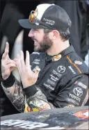  ?? Ed Zurga ?? The Associated Press Martin Truex Jr. counts off his seventh NASCAR Cup Series victory of the season on Sunday at Kansas Speedway in Kansas City, Kan.