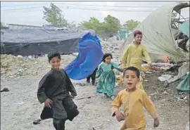  ?? Ebrahim Noroozi Associated Press ?? A WOMAN wears a burqa Sunday in Kabul. A day after the Taliban’s edict that only a woman’s eyes be visible, most wore a hijab, which leaves the face uncovered.