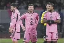  ?? AP photo ?? Inter Miami’s Lionel Messi (center) reacts with teammates during a penalty shootout during a friendly between Vissel Kobe and Inter Miami on Wednesday.