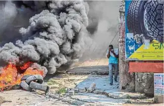  ?? AFP ?? Las pandillas han tomado el control de buena parte de Puerto Príncipe, que sufre una crisis política.