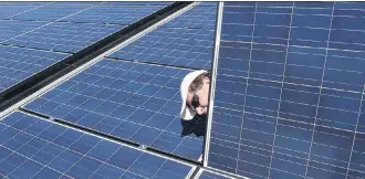  ?? FRANK GUNN/THE CANADIAN PRESS ?? The National Energy Board’s study finds that the only places where using solar panels is already cheaper than paying for power from grids are the places where power rates are high.