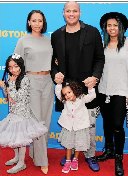  ??  ?? Family: Mel B and Stephen Belafonte with Angel, left, Madison and Phoenix Chi in 2015