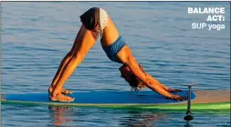  ??  ?? BALANCE ACT: SUP yoga