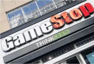  ?? CARLO ALLEGRI • REUTERS ?? Shares in GameStop soared again Thursday, though nowhere near what they peaked at during a social media-fuelled rally last month.