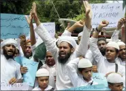  ?? K.M. CHAUDARY — THE ASSOCIATED PRESS ?? Pakistani religious students attend an anti-Indian rally Wednesday in Lahore, Pakistan.