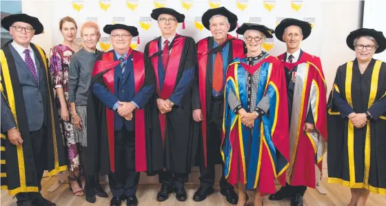  ?? ?? HONOUR: Chancellor John Dornbusch, Dr Hannah Tehan, Mary Rohde and (far right) Vice-Chancellor Professor Geraldine Mackenzie congratula­ted the University of Southern Queensland's latest honoraries, Professor Emeritus Paul Bates, Professor Emeritus John Cole OAM, Professor Emeritus John Thompson PSM, Dr Carol Cox AM, and Major General (Retd) Stuart Smith AO DSC.