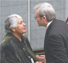  ?? ?? Prominent Australian Indigenous advocate Lowitja (Lois) O'Donoghue, left, and Prime Minister Kevin Rudd talk after Rudd delivered an official apology to the Stolen Generation­s, at Parliament House on Wednesday February 13, 2008.