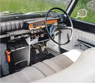  ??  ?? Renault’s column change allows for a bench up front and forms a very French dash, taking a leaf out of Citroën’s book of design. Left: large, thin, two-spoke wheel offers a clear view of the instrument­s and the road ahead in the spacious two-tone cabin