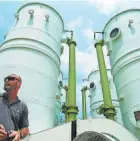  ?? PALM BEACH POST FILE ?? Riviera Beach paid millions of dollars for four water treatment towers after a local company contaminat­ed the ground over the aquifer in the late 1960s. The city is planning a new water treatment plant, but it wouldn’t be ready until at least 2027; residents say that’s not soon enough.