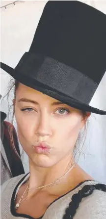  ??  ?? Amber Heard poses in a photo posted on Instagram on Friday. SUZANNE SIMONOT
