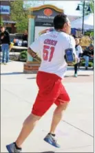  ?? DIGITAL FIRST MEDIA FILE PHOTO ?? A man runs through a shopping center for the Sprint-N-Shop 5K at the Philadelph­ia Premium Outlets.