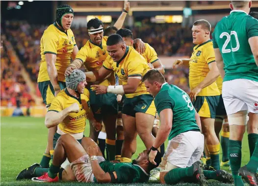  ?? PICTURES: Getty Images ?? Match-winner: David Pocock celebrates his crucial try for the Wallabies