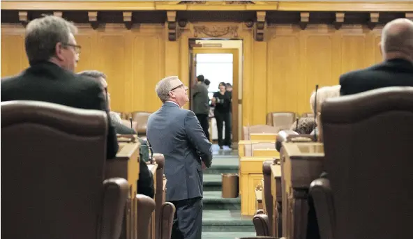  ?? TROY FLEECE ?? Premier Brad Wall walks into the chamber at the Legislativ­e Building for his final question period on Wednesday.