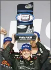  ??  ?? Johnny Sauter celebrates in Victory Lane after winning the NASCAR Camping World Truck Series TheHouse.com 225 at Chicagolan­d Speedway on Sept 15 in Joliet, Illinois. (AFP)