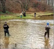  ?? TOM TATUM-DIGITAL FIRST MEDIA ?? Anglers try their luck in the Brandywine Creek as trout season opens.