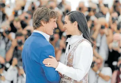  ?? Foto: Guillaume Horcajuelo ?? El actor Tom Cruise y la actriz Jennifer Connelly en el photocall del Festival de Cannes.