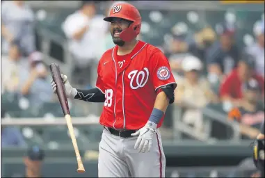  ?? JULIO CORTEZ — THE ASSOCIATED PRESS ?? The Nationals’ Kurt Suzuki reacts after striking out to Marlins pitcher Caleb Smith during a March 10spring training game in Jupiter, Fla.