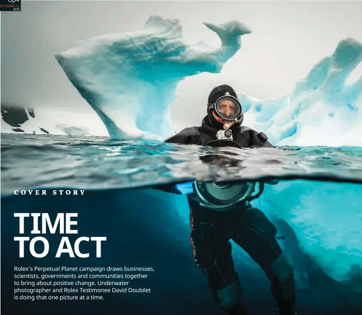  ??  ?? Doubilet at work with his Rolex in the cold waters of the Arctic Ocean